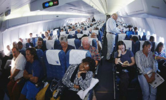 Lý do chênh lệch giá vé máy bay dù ngồi cùng hàng ghế